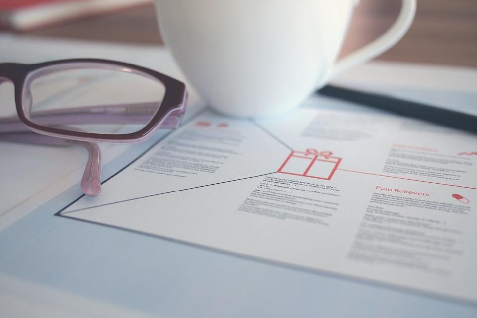 Reading glasses on a printed document