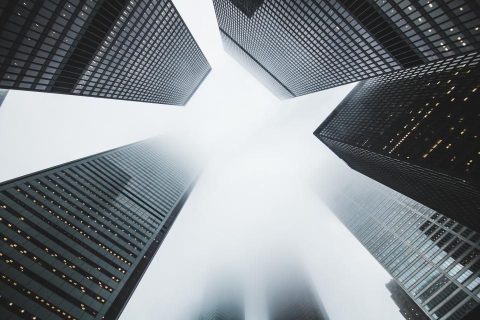Looking up at office skyscrapers