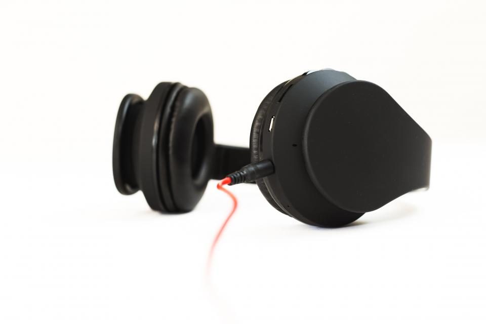 Black headset on a white background