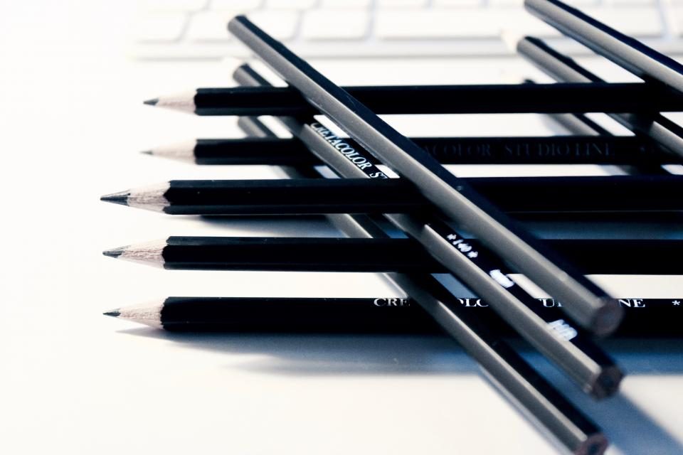 Row of black pencils