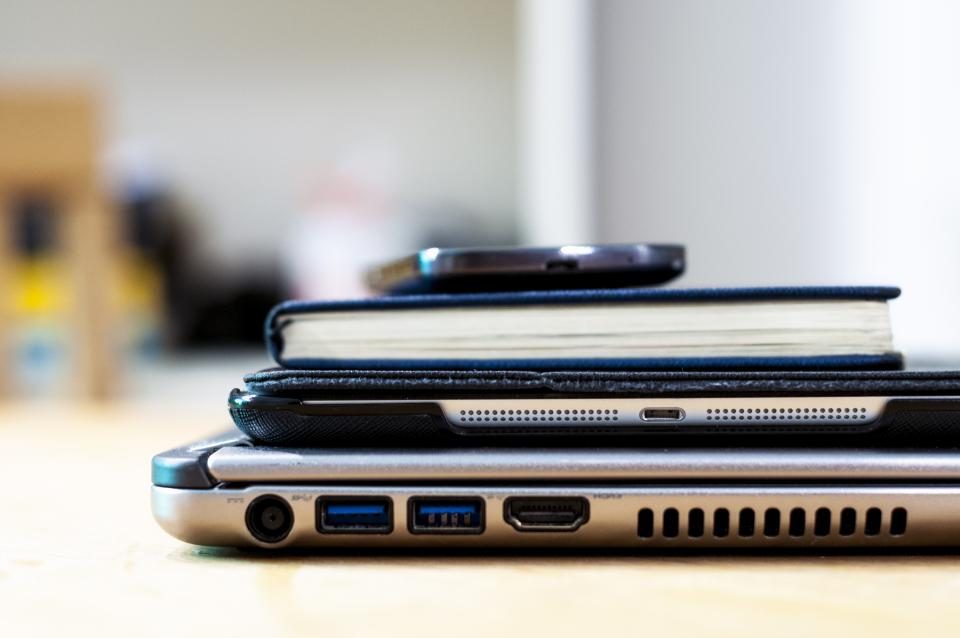 Stack of laptops showing their ports