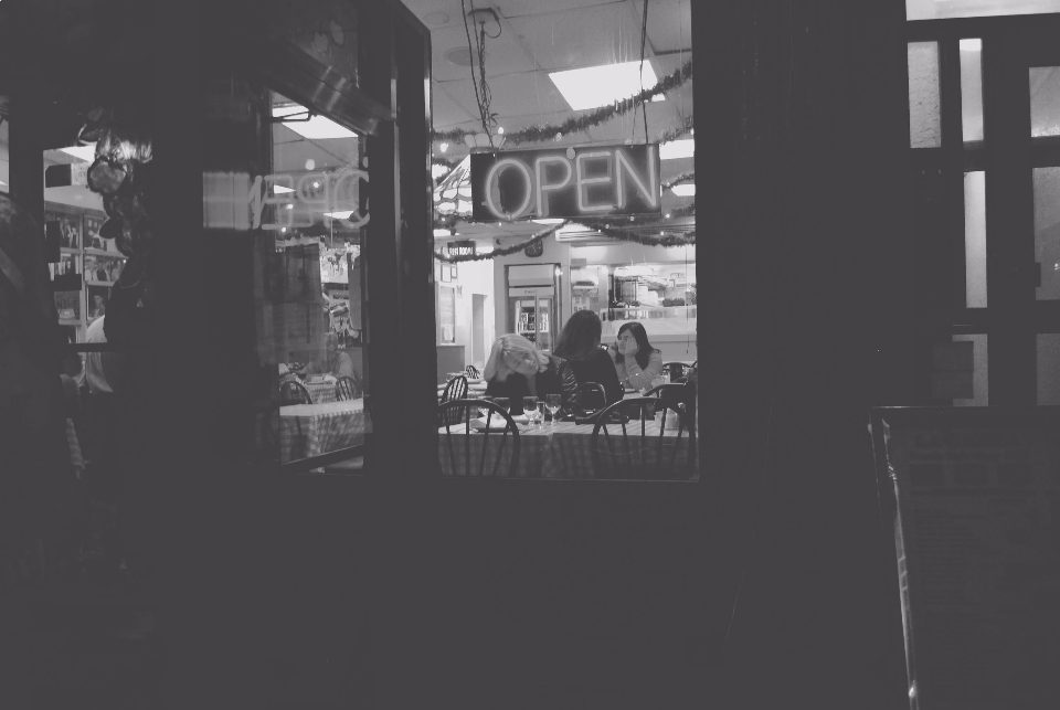 Café entrance with an open sign