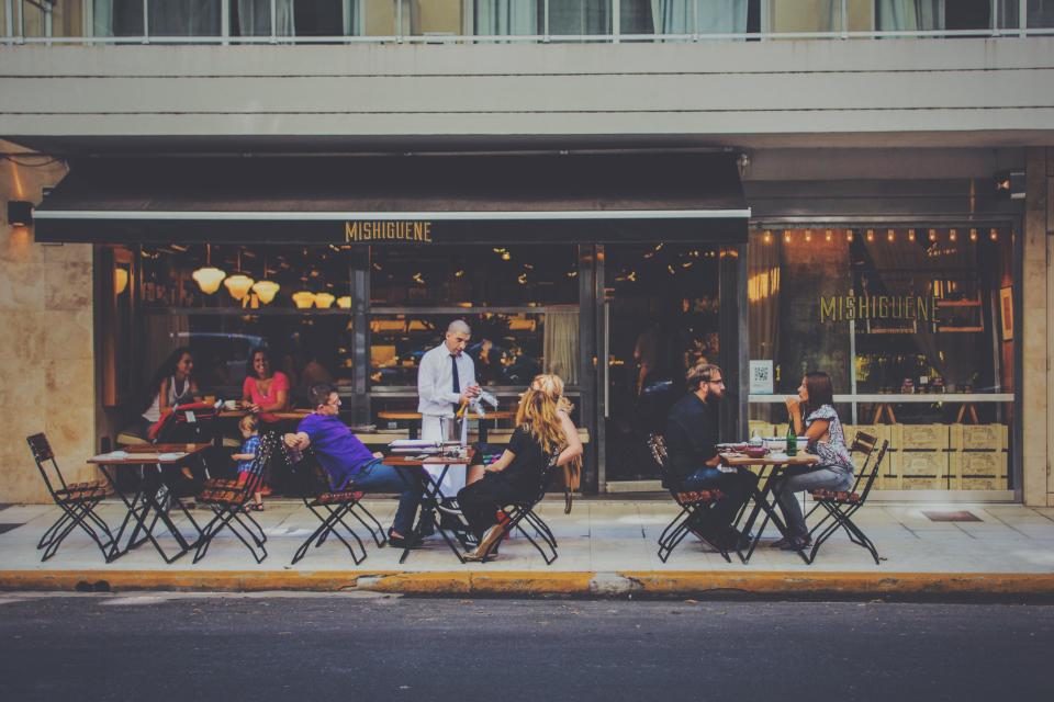 Busy café terrace with customers