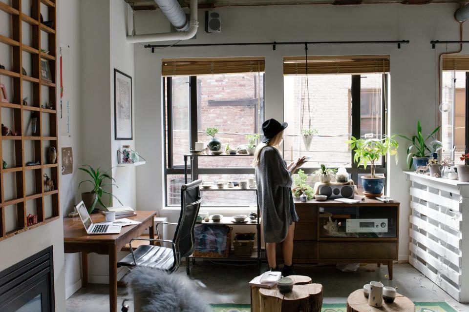 Woman working in a bright loft office