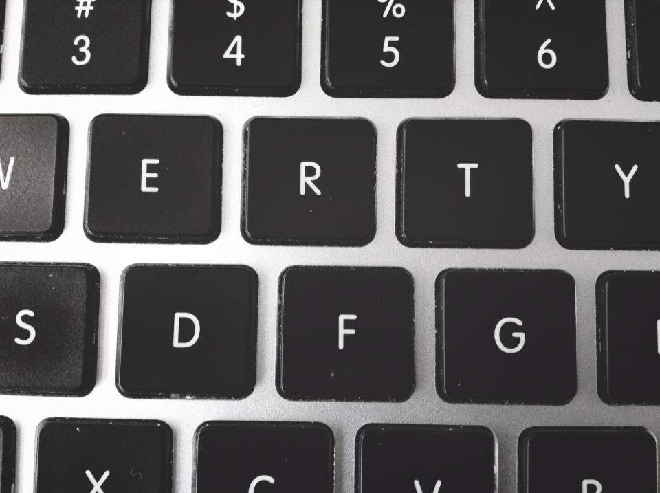Black keyboard keys close-up