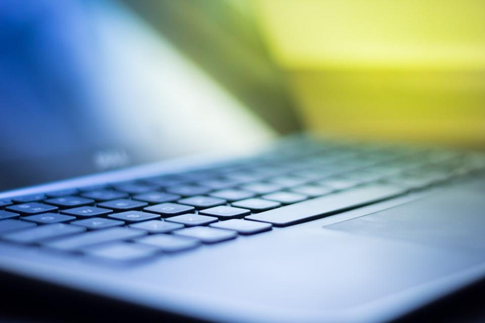 Laptop keyboard in soft light