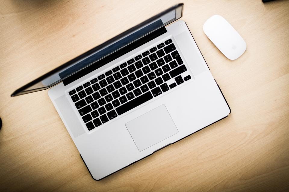 Laptop on a wooden desk