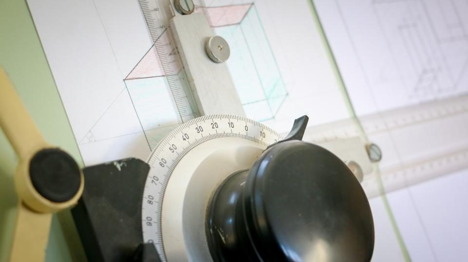 Drafting machine on a drawing board