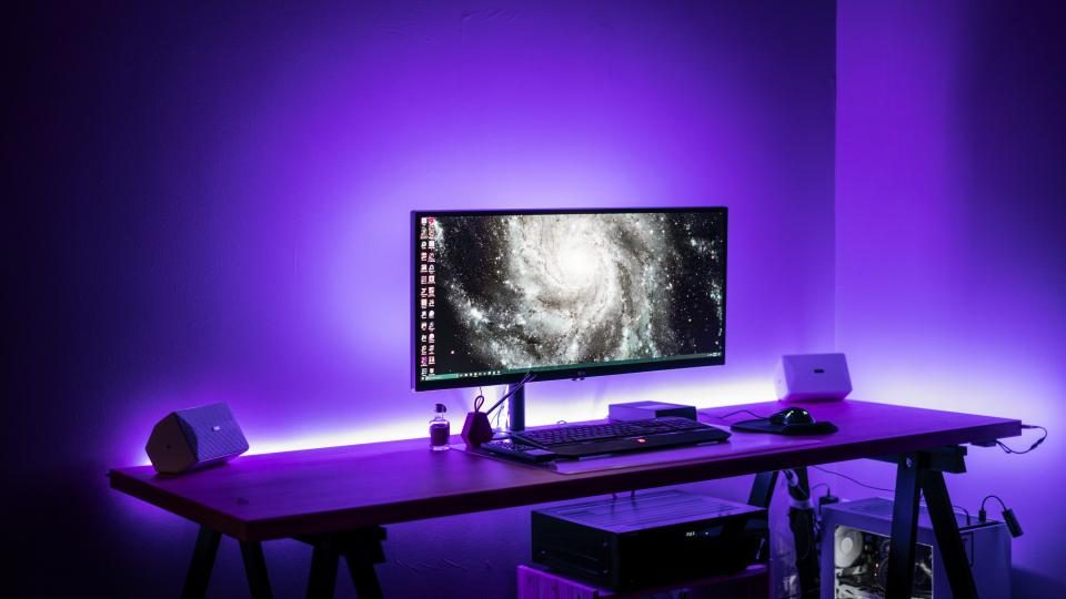Desk set-up lit in purple