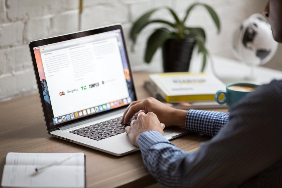Man working on a laptop at a desk