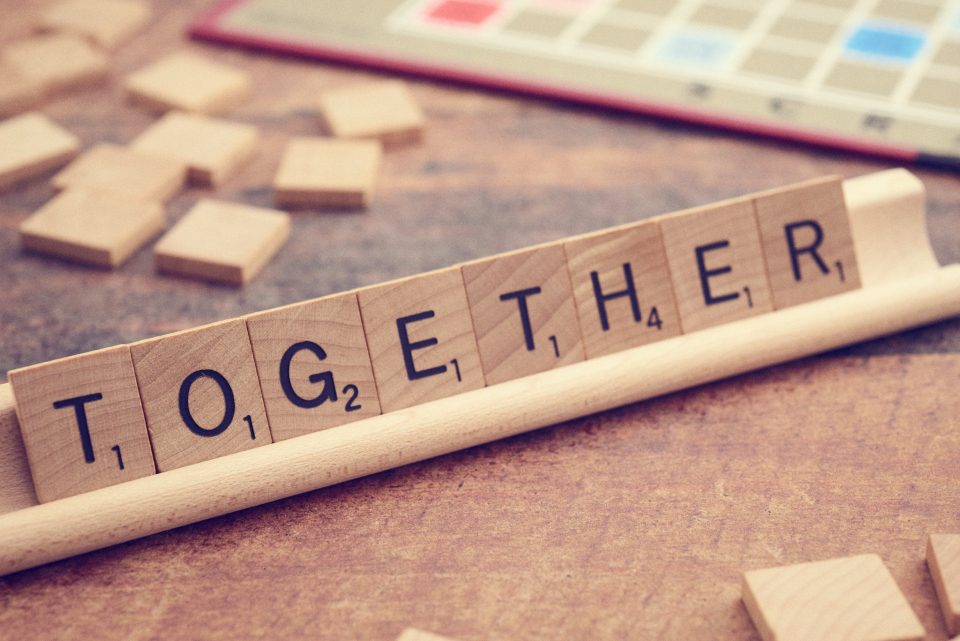 Letter tiles spelling together
