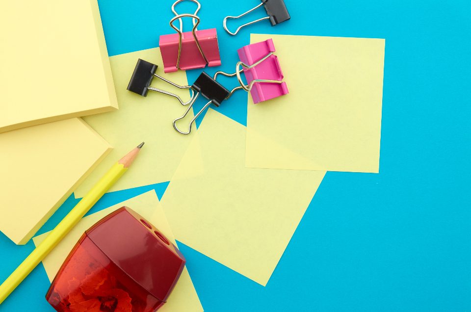 Colourful office supplies and sticky notes